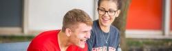 close-up of two students laughing