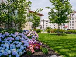 exterior of the Rec Center featuring flowers